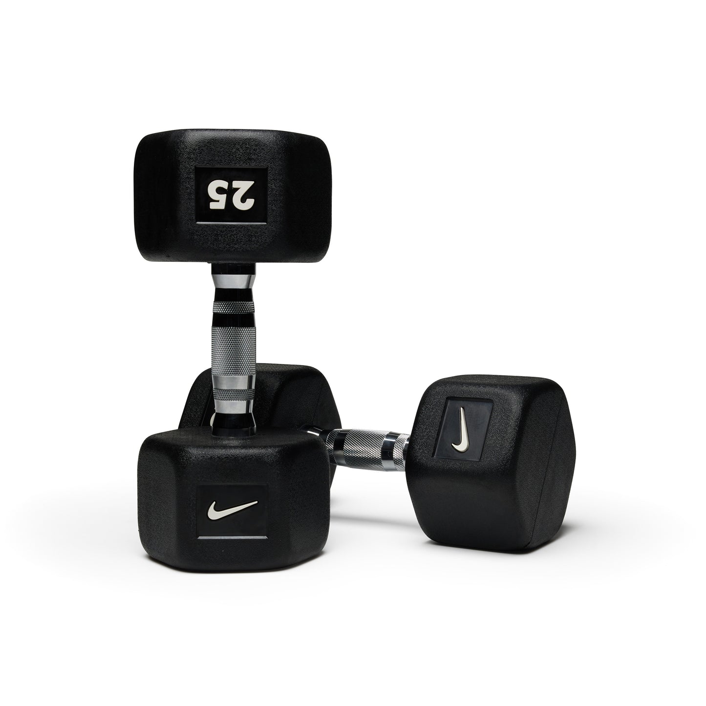 Various black hex dumbbells standing upright showing different weight options for progressive strength training.