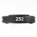 XM Competition 25lb weight plates with ergonomic handles for powerlifting and Olympic weightlifting exercises.